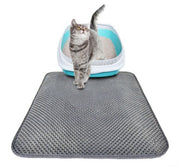 Bluey's Waterproof Litter Trap Mat in front of a cat litter box